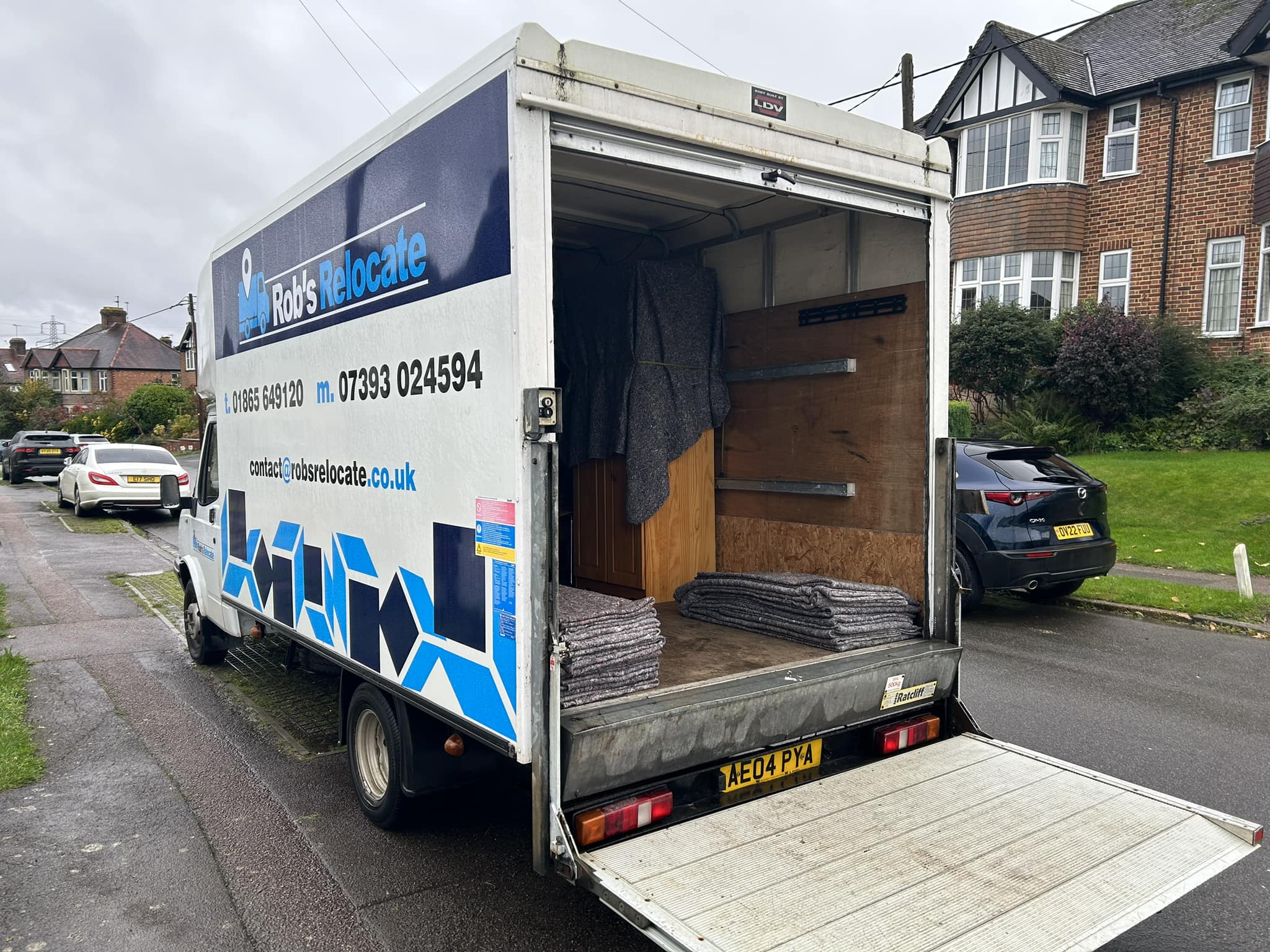 Rob's Relocate Professional Moving Service Van